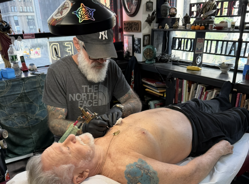 Mike bellamy tattooing Joao Portinoi at Red Rocket Tattoo in Midtown Manhattan, NYC.