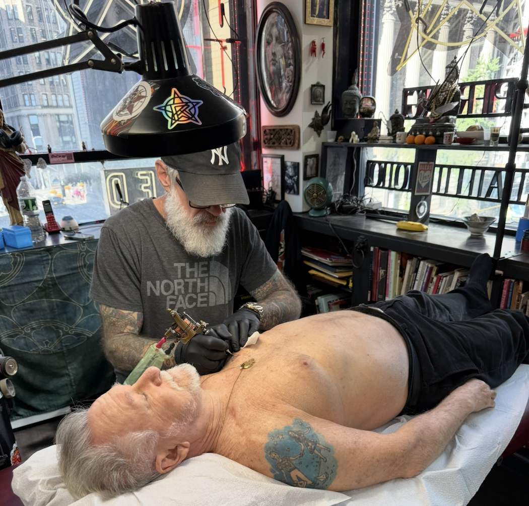 Mike bellamy tattooing Joao Portinoi at Red Rocket Tattoo in Midtown Manhattan, NYC.